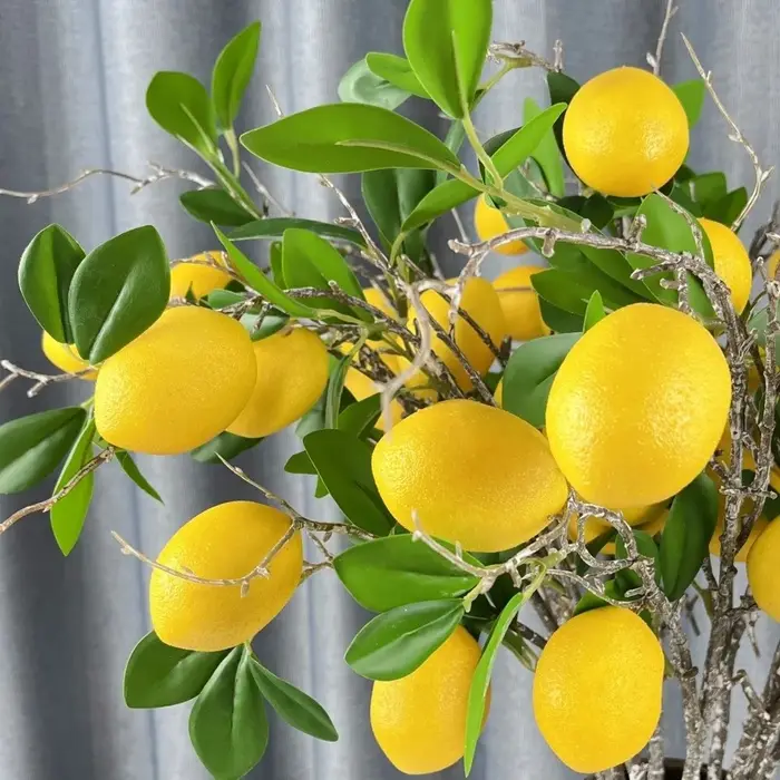 Branche de citron artificielle à feuilles vertes