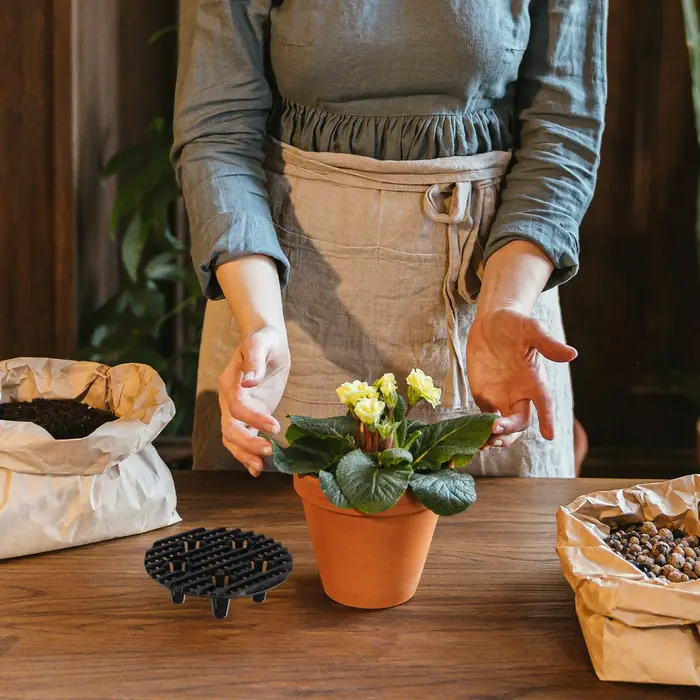 Pieds de Pot de plantes en plastique pour jardinières extérieures