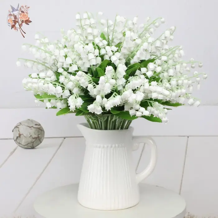Bouquet de fleurs artificielles du muguet blanc