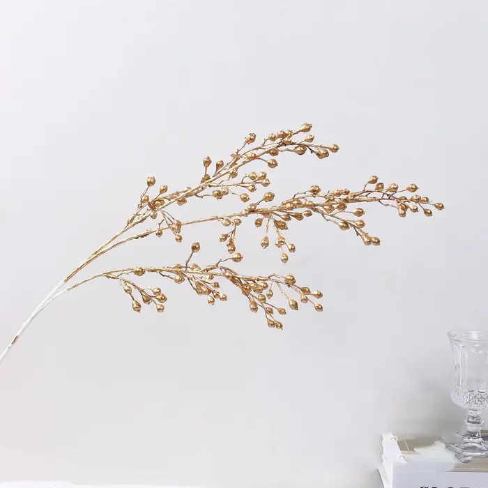 Plantes artificielles dorées