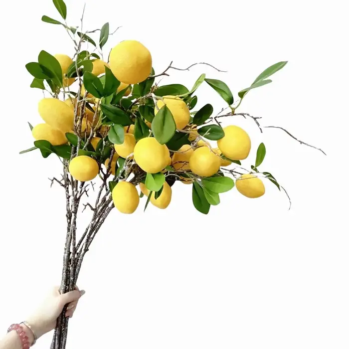 Branche de citron artificielle en feuilles vertes