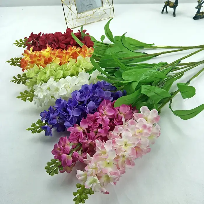 Branche de fleur violette artificielle de jacinthe avec feuille