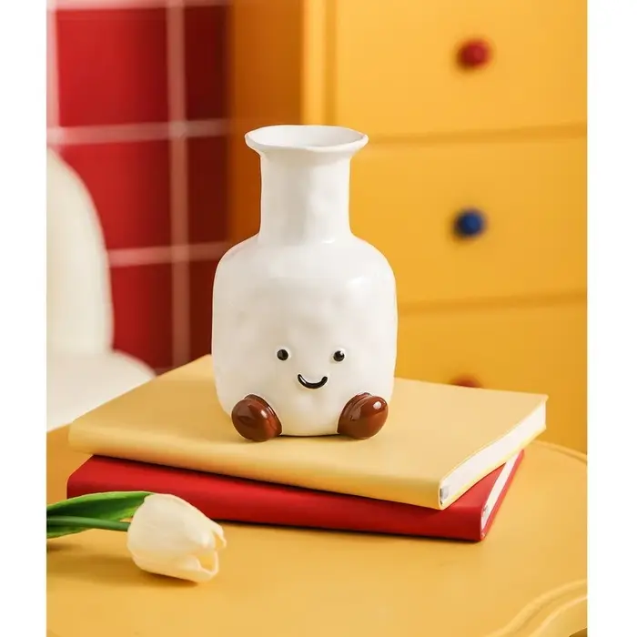 Vase à visage souriant mignon