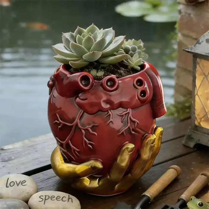 Pot de fleurs en résine rouge en forme de cœur anatomique avec support doré pour plantes succulentes