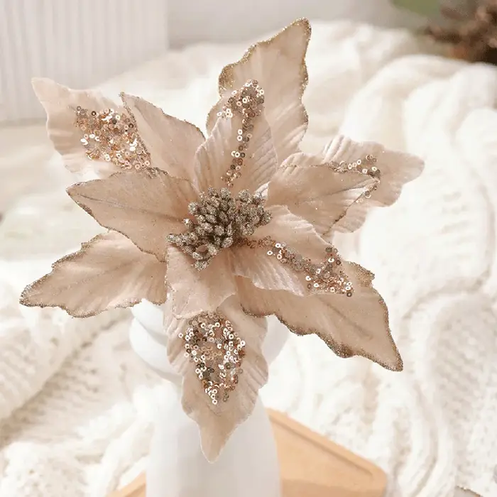 Fleur de poinsettia scintillante pour Noël
