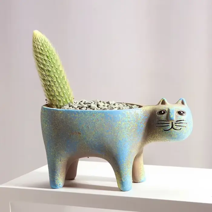 Pot de fleur en céramique de chat mignon