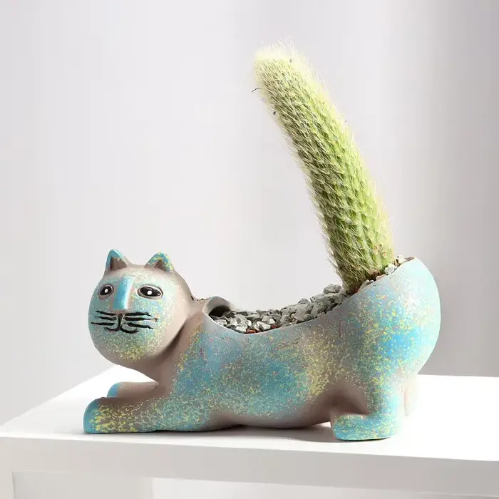 Pot de fleur en céramique de chat mignon