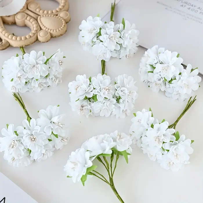 Oeillet de fleurs en soie simulée