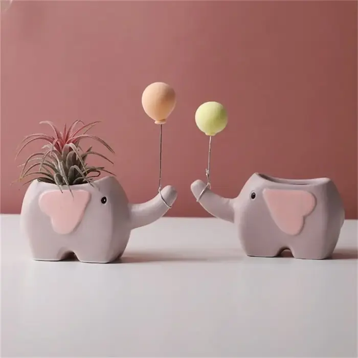 Pot de fleurs en céramique en forme d'éléphant
