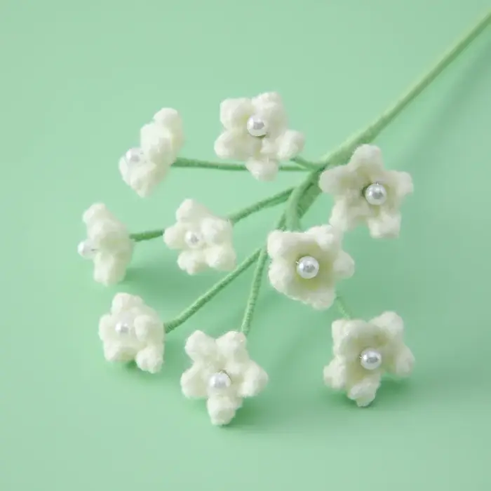 Jolies fleurs au crochet en forme d'étoiles, fleurs tricotées finies, fleurs artificielles faites à 