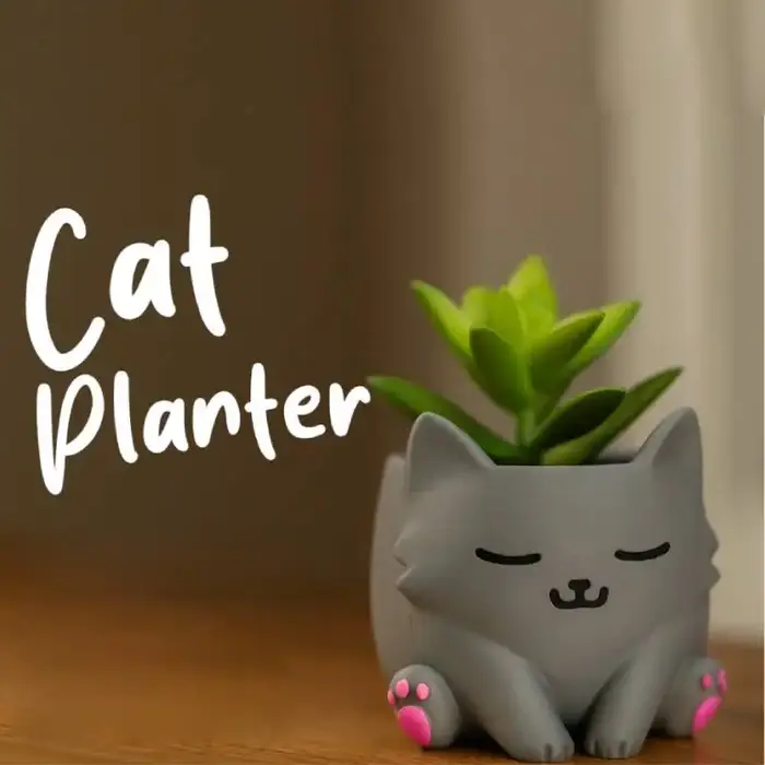 Pot de fleurs en forme de chat mignon