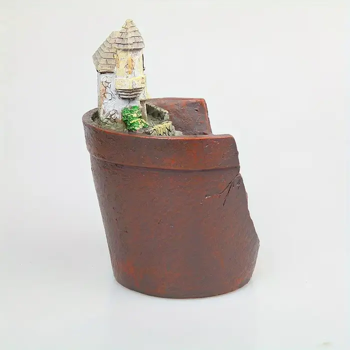 Pot de plantes créatif avec ville du ciel
