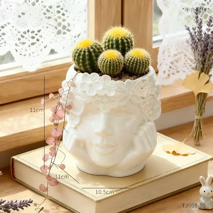 Pot de fleurs en résine décoré de fleurs