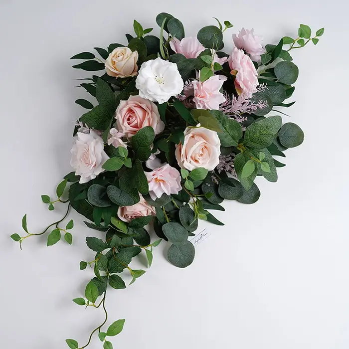 Série rose blanc avec panneau de bienvenue vert