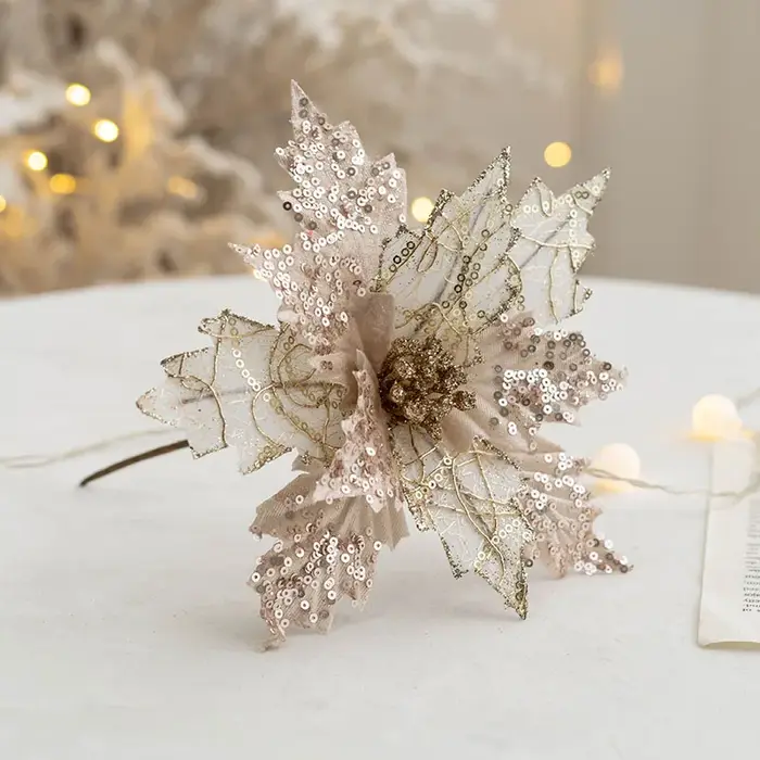 Fleur de Noël de simulation d'or