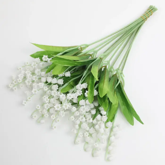 Bouquet de fleurs artificielles en forme de cloche