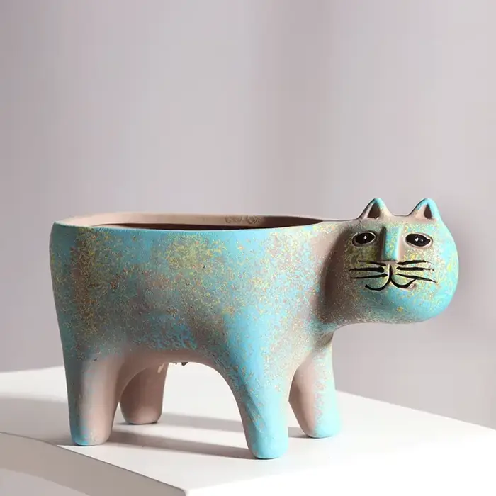 Pot de fleur en céramique de chat mignon