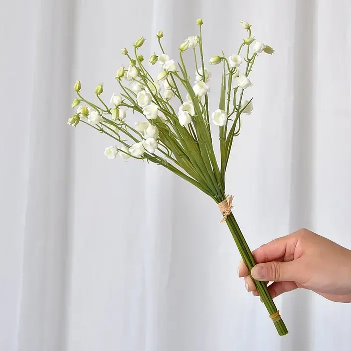 Bouquet de fleurs artificielles de muguet