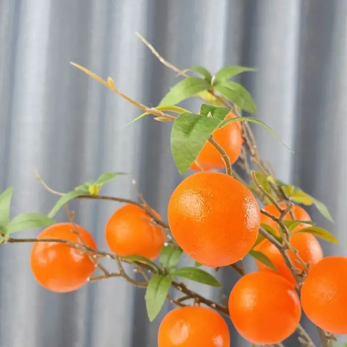 Branche d'Orange Artificielle Feuilles Vertes