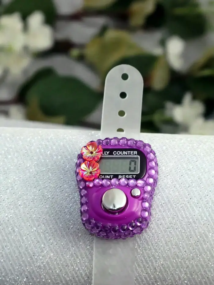 Compteur de doigts en forme de fleur