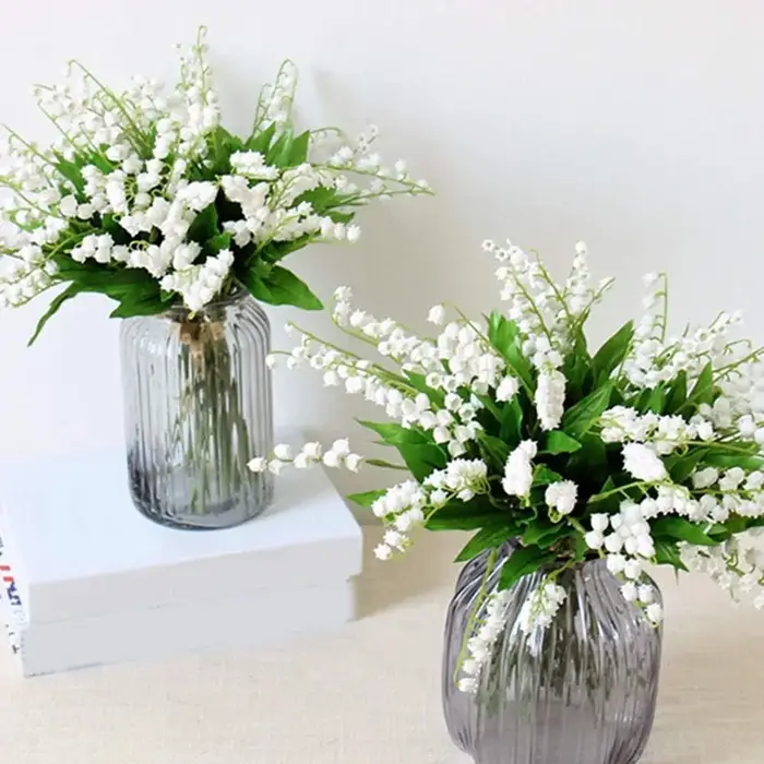 Bouquet de fleurs artificielles de lys blancs du val