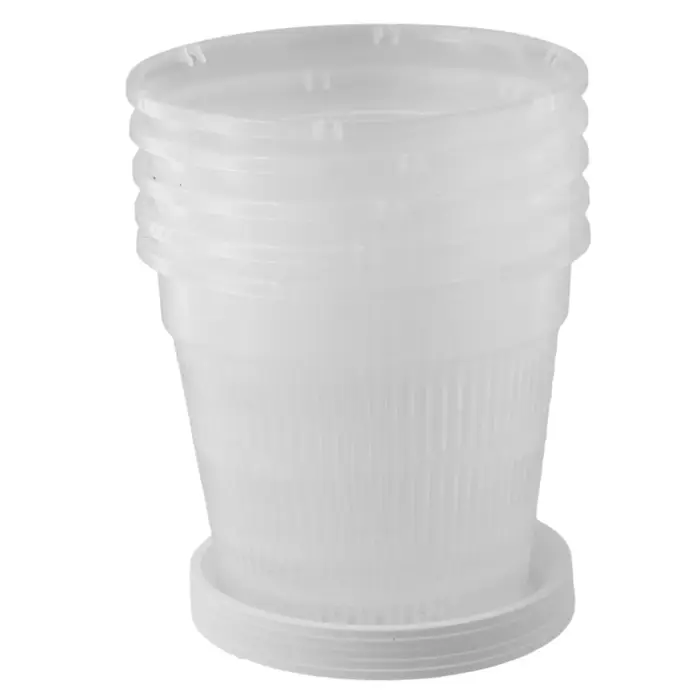 Pot d'orchidée avec soucoupes