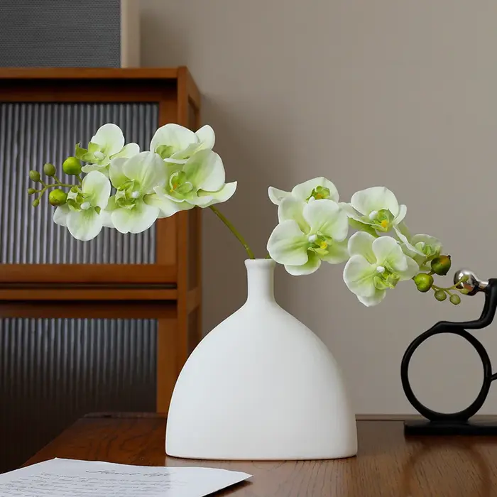 Orchidée papillon au toucher réel