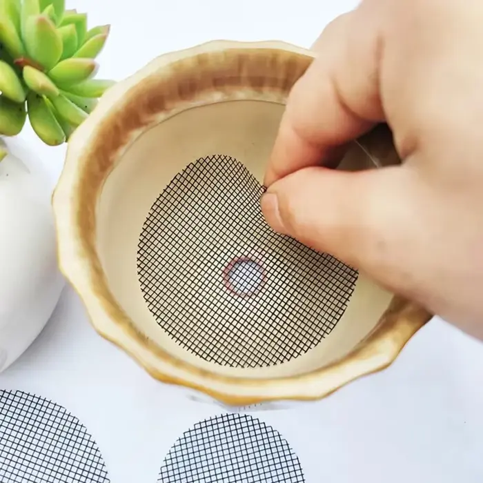 Grille de protection pour fond de pot