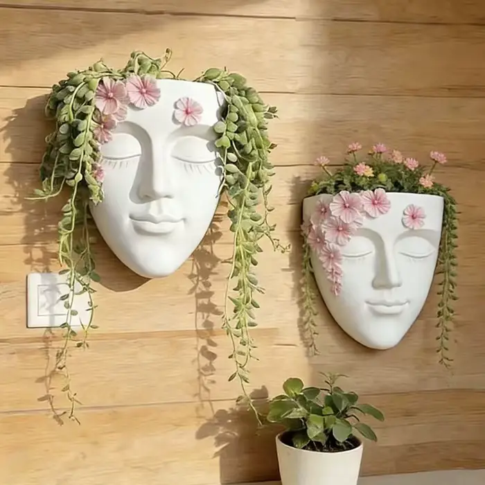 Pot de fleurs mural classique en forme de tête