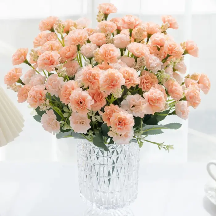 Couronne d'oeillets de fleurs artificielles