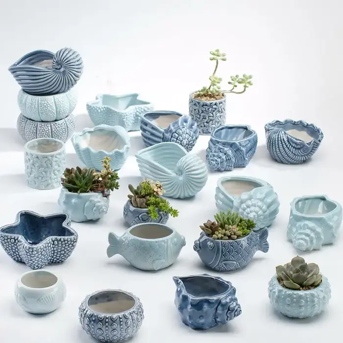 Pot de fleurs miniature en forme de baleine et de coquillage