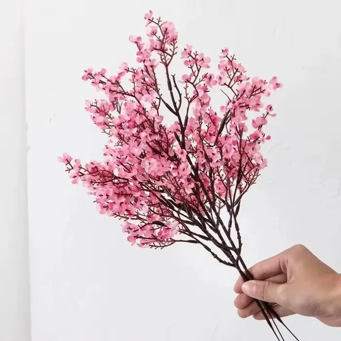Fleurs artificielles roses