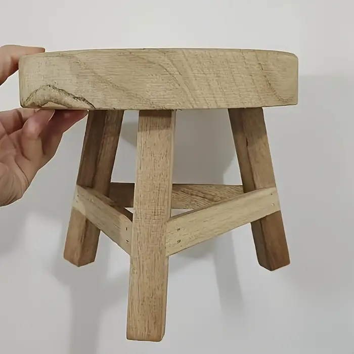 Petit tabouret rond en bois pour plantes d'intérieur