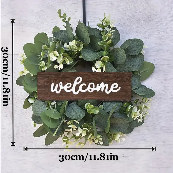 Couronne d'eucalyptus vert avec signe de bienvenue