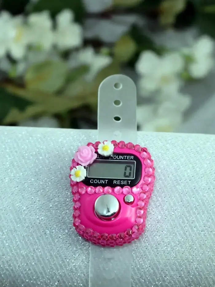 Compteur de doigts en forme de fleur