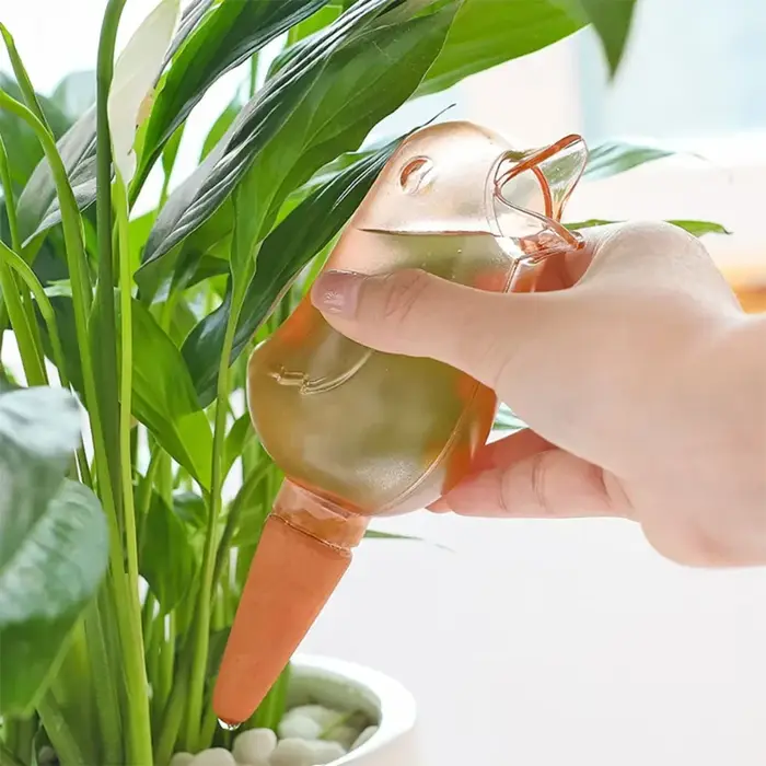 Arroseur automatique en forme d'oiseau pour plantes d'intérieur