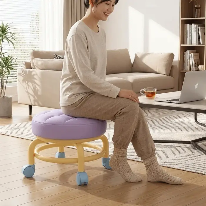 Tabouret à roulettes rond avec siège rembourré