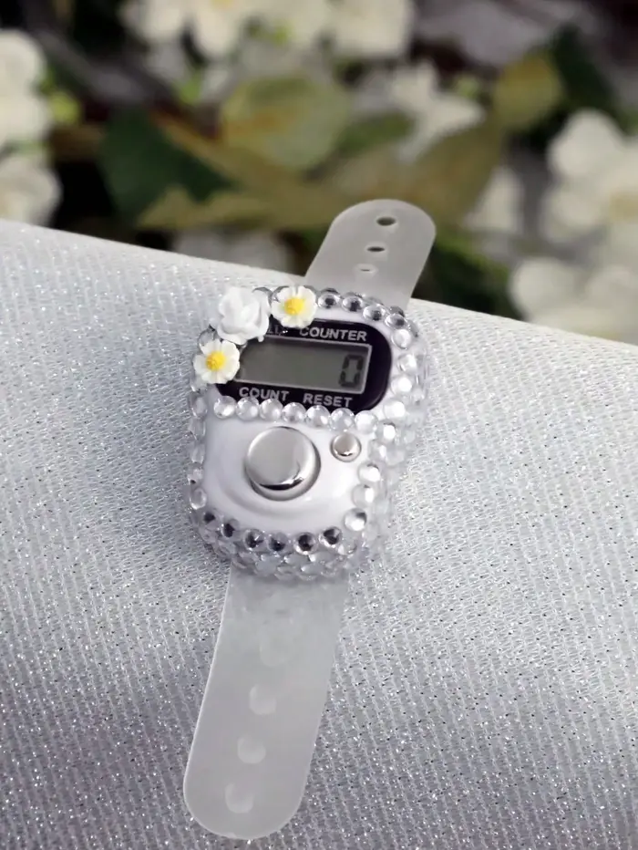 Compteur de doigts en forme de fleur