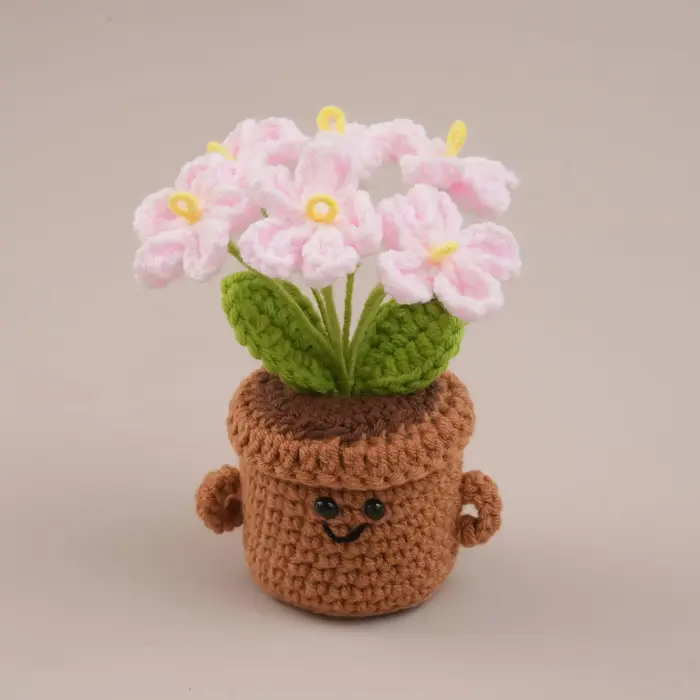 Pot de fleurs au crochet mignon