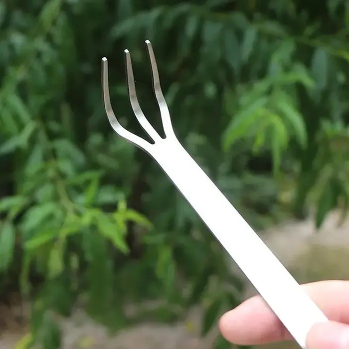 Râteau à racines en acier inoxydable