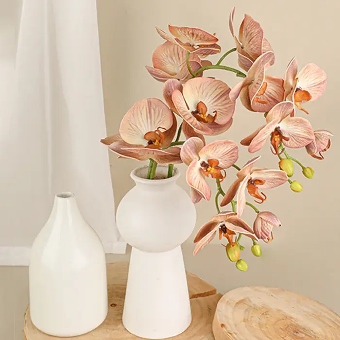 Branche de fleurs artificielles orchidées