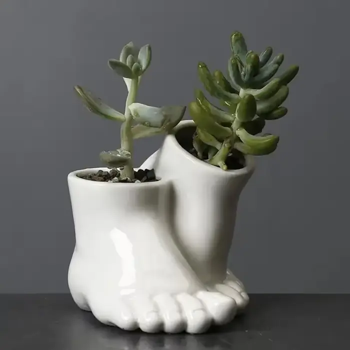 Pot de fleurs en céramique créatif en forme de pied