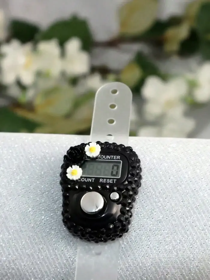 Compteur de doigts en forme de fleur