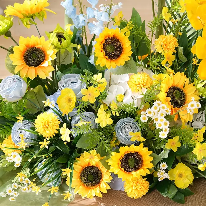 Arrangement de fleurs suspendues orchidées tournesol jaune