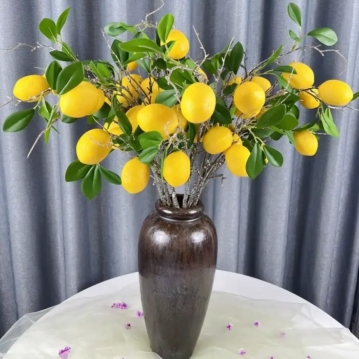 Branche de citron artificielle à feuilles vertes