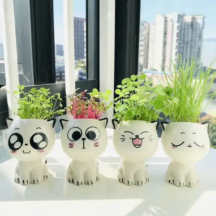 Pot de fleurs en céramique en forme de chat