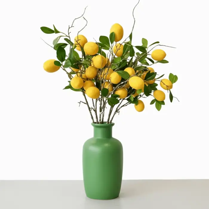 Branche de citron artificielle à feuilles vertes