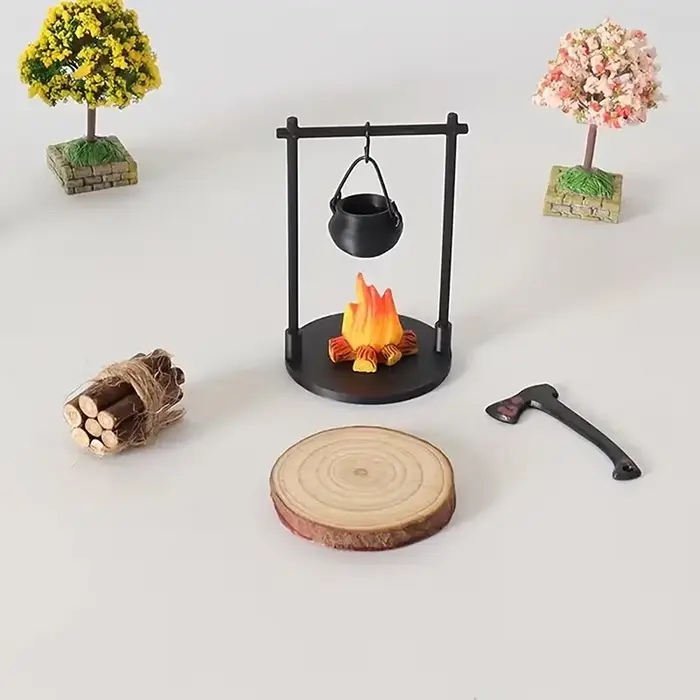 Feu de camp miniature et théière
