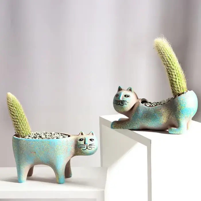 Pot de fleur en céramique de chat mignon