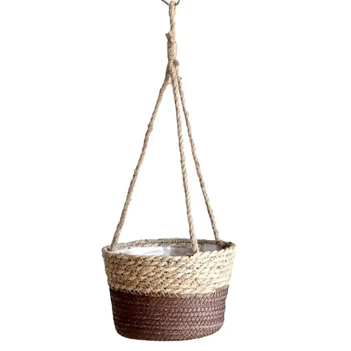 Paniers de fleurs suspendus tissés en herbe